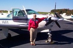 A CFI pauses beside his student's plane after a successful session.