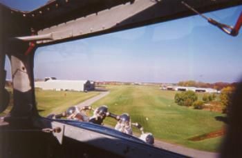 Pioneer Airport and the EAA Museum from the right front seat of a Ford 4AT Trimotor.